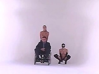 Horny paraplegic dude gets to pole two hot and horny dominatrix sluts